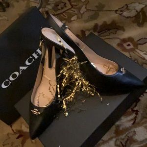 Black slinging sling backs